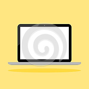 Laptop computer with blank white screen isolated on yellow background