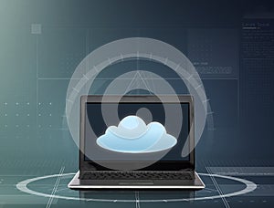 Laptop computer with cloud icon on screen