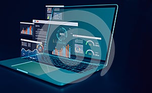 Laptop computer on dark background and dashboard for business analysis. Data and management system with KPIs and indicators