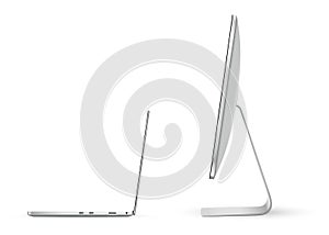Laptop and computer flat screen side view