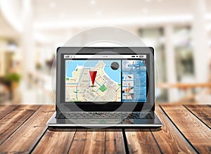 Laptop computer with gps navigator map on screen