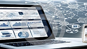 A laptop computer is open to a screen displaying a complex network of data