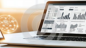 A laptop computer is open to a screen displaying a graph