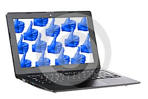 Laptop computer with screen full of thumb up isolated on white background