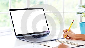 Laptop computer screen mockup, template background, Woman typing laptop computer with blank screen at coworking space, office,