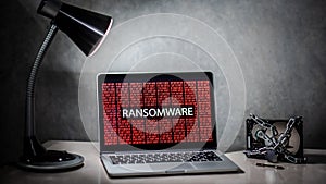 Laptop computer screen with ransomware attack alert