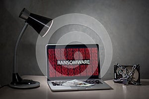 Laptop computer screen with ransomware attack alert