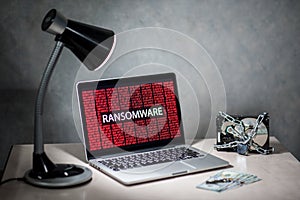 Laptop computer screen with ransomware attack alert