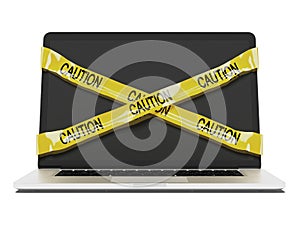 Laptop computer with yellow caution tape