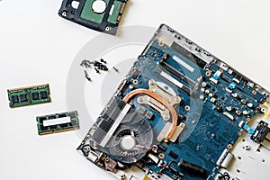Laptop disassembling parts and devices on white background, laptop repair