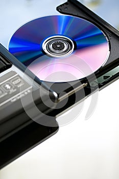 Laptop with a disk dvd. Close up.