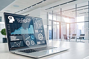 Laptop displaying data analytics in modern office