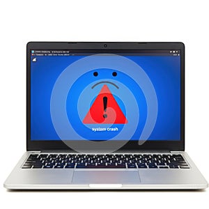 Laptop displaying system crash error isolated on white background. for it support, software issues, and technical problems