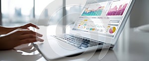 The laptop displaying various data visualizations and analytics for business insights.AI generated image