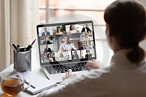 On laptop diverse people collage webcam view over woman shoulder photo