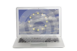 Laptop with Flag of European Union a background of blue sky and clouds on screen