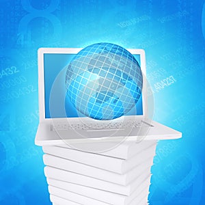 Laptop and globe on white stack of books