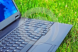 Laptop on grass