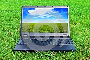 Laptop on grass