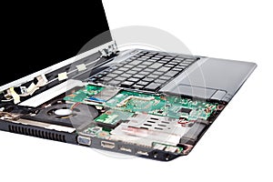 Laptop half disassembled. Repair service concept. Close up