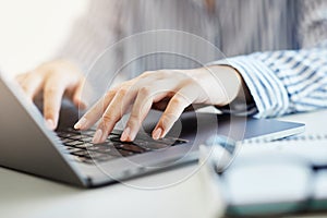 laptop hand computer technology business office communication internet typing working businesswoman
