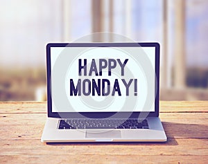 Laptop with happy Monday wish