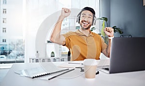 Laptop, headphones and business man celebrate success while listening to music, audio or video call. Excited asian male