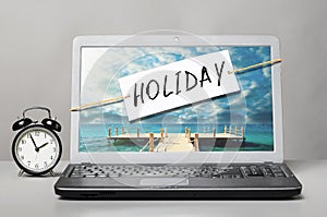 Laptop with holiday note