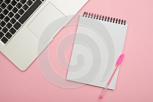 Laptop with jotter and pen for planning