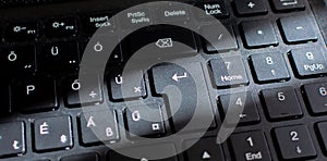 Laptop Keyboard, Black Keyboard. Keyboard Close Up with Sun Ray