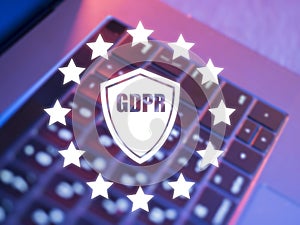 Laptop keyboard blurred background using digital GDPR interface