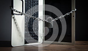 Laptop locked with chains and padlock