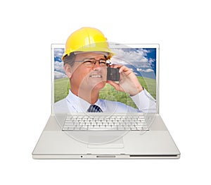 Laptop and Man with Hard Hat on Cell Phone