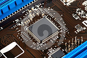 Laptop microchip on motherboard closeup