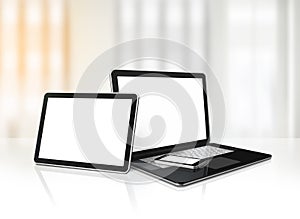 Laptop, mobile phone and digital tablet pc on office desk