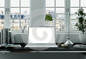 Laptop Mock-up with white Screen Stands on the Office Desk