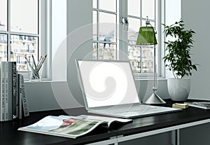 Laptop Mock-up with white Screen Stands on the Office Desk