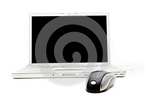 Laptop and mouse, focus on mouse