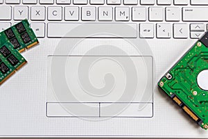 Laptop and notebook data storage components like hdd, hard disk drive, ram memory show data backup, data security and technical