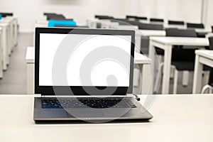 Laptop, online business, teacher work in the classroom.Laptop put on a table or desk