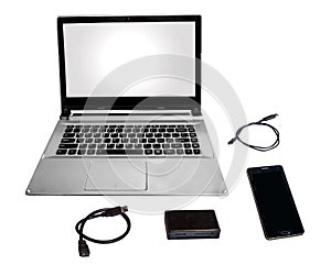 Laptop PC smart phone card reader and data cables chord isolated in white.