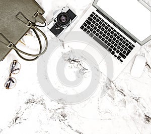 Laptop phone designer bag vintage photo camera Fashion flat lay