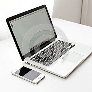 Laptop and phone on a desk