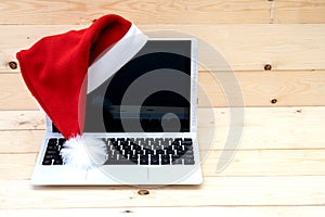 Laptop and Santa Claus hat
