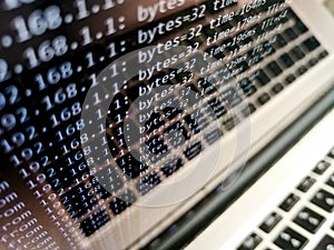 Laptop Screen with command prompt and multiple pings