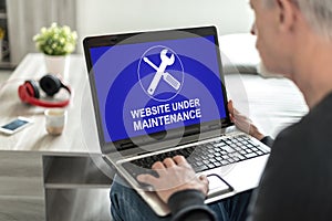 Website maintenance concept on a laptop screen