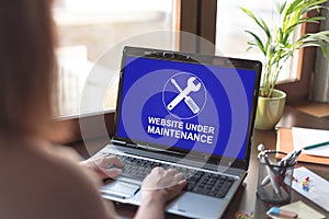 Website maintenance concept on a laptop screen