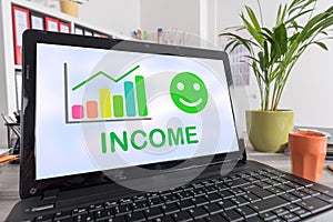 Income growth concept on a laptop