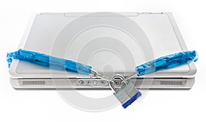 Laptop Secured with Chain and Padlock Symbolizing Digital Security