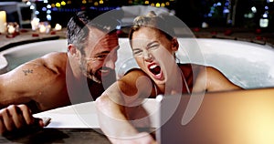 Laptop selfie, hot tub and happy couple pose, relax and enjoy fun Valetines Day date, honeymoon and post memory photo